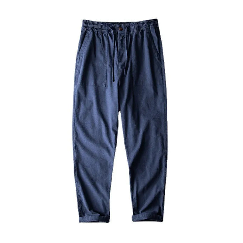 Men's linen casual trousers in navy blue, apricot, or grey with mid waist design