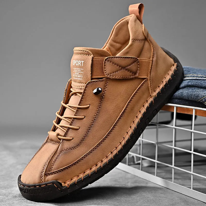 Men's mid-top Martin boots with elastic band closure in khaki colour, showing round toe and mid-calf design