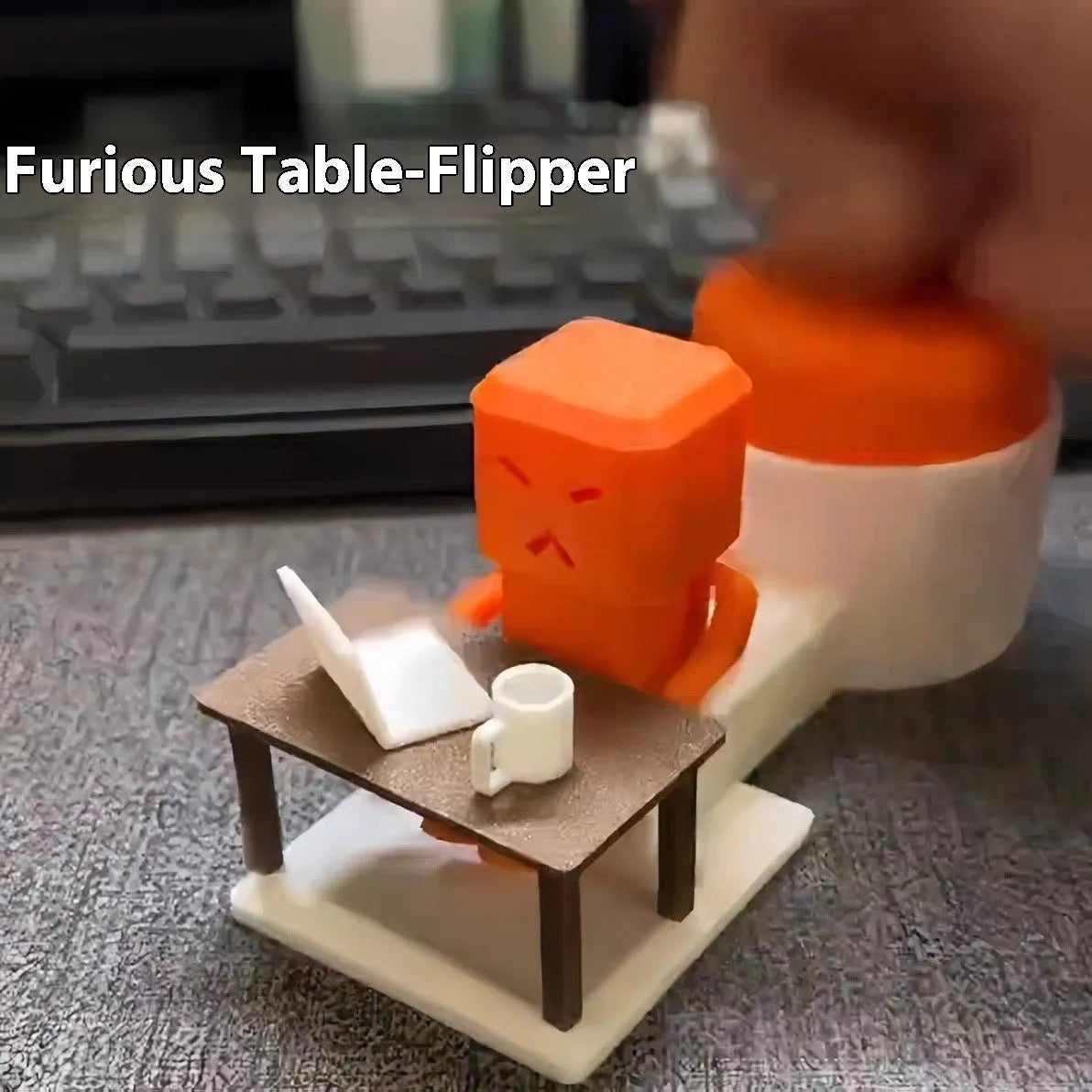Orange plastic table-turning decompression toy measuring 16x6x7cm on wooden desk