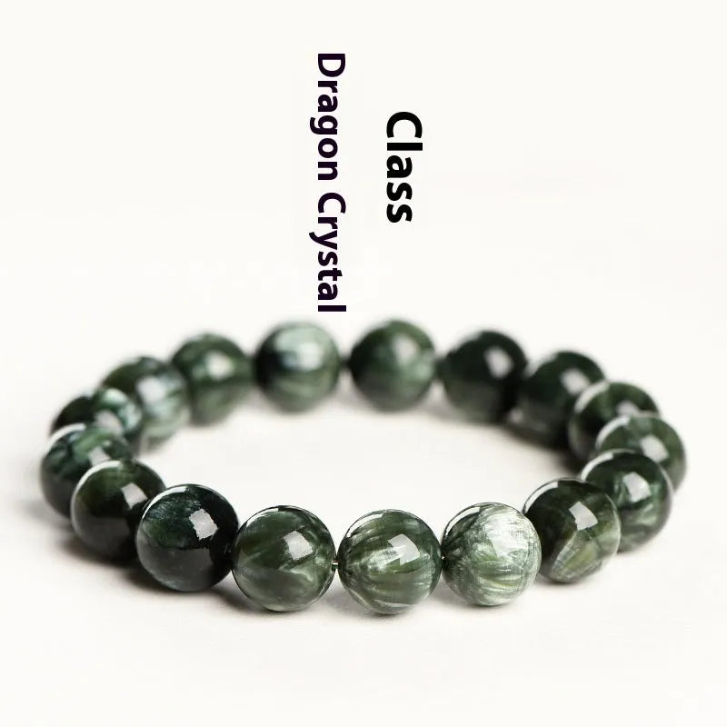 Green Dragon Crystal bracelet with 8-9mm round beads showing Ruyi design detail and geometric shape