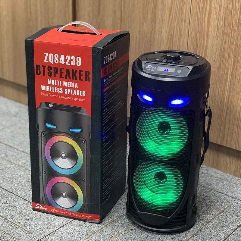Black portable Bluetooth speaker with dual horn design and wheat-themed accents