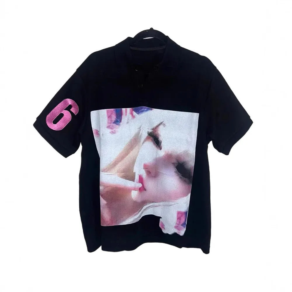 A man's short-sleeve printed polo shirt in a straight cut, made from polyester fabric.