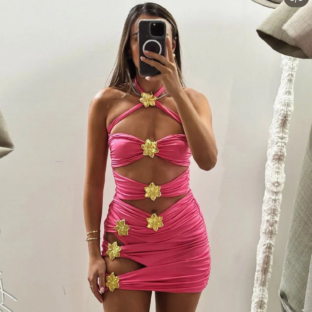 Women's solid colour one-piece swimsuit with detachable skirt showing high-waist design and hollow-out tube top detail