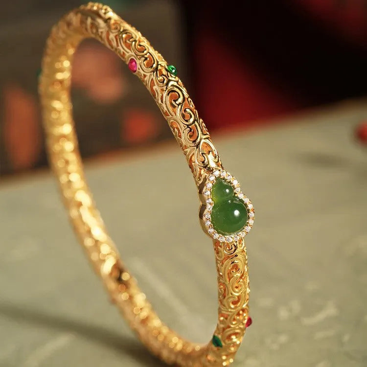 Women's gold-plated bracelet with xiangyun gourd charm and retro opening clasp on copper construction
