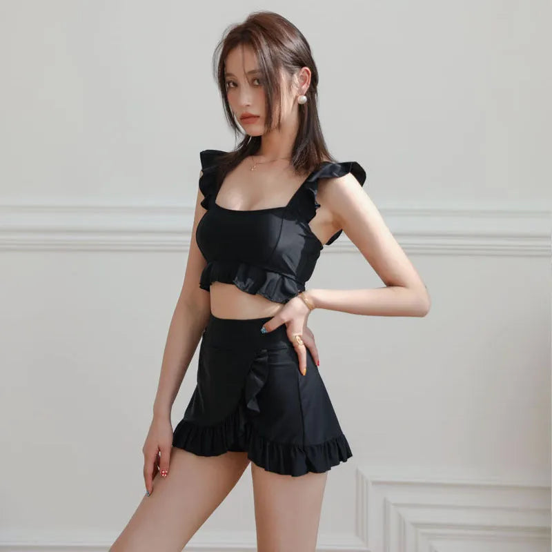 Black nylon swimsuit for women with split brief design