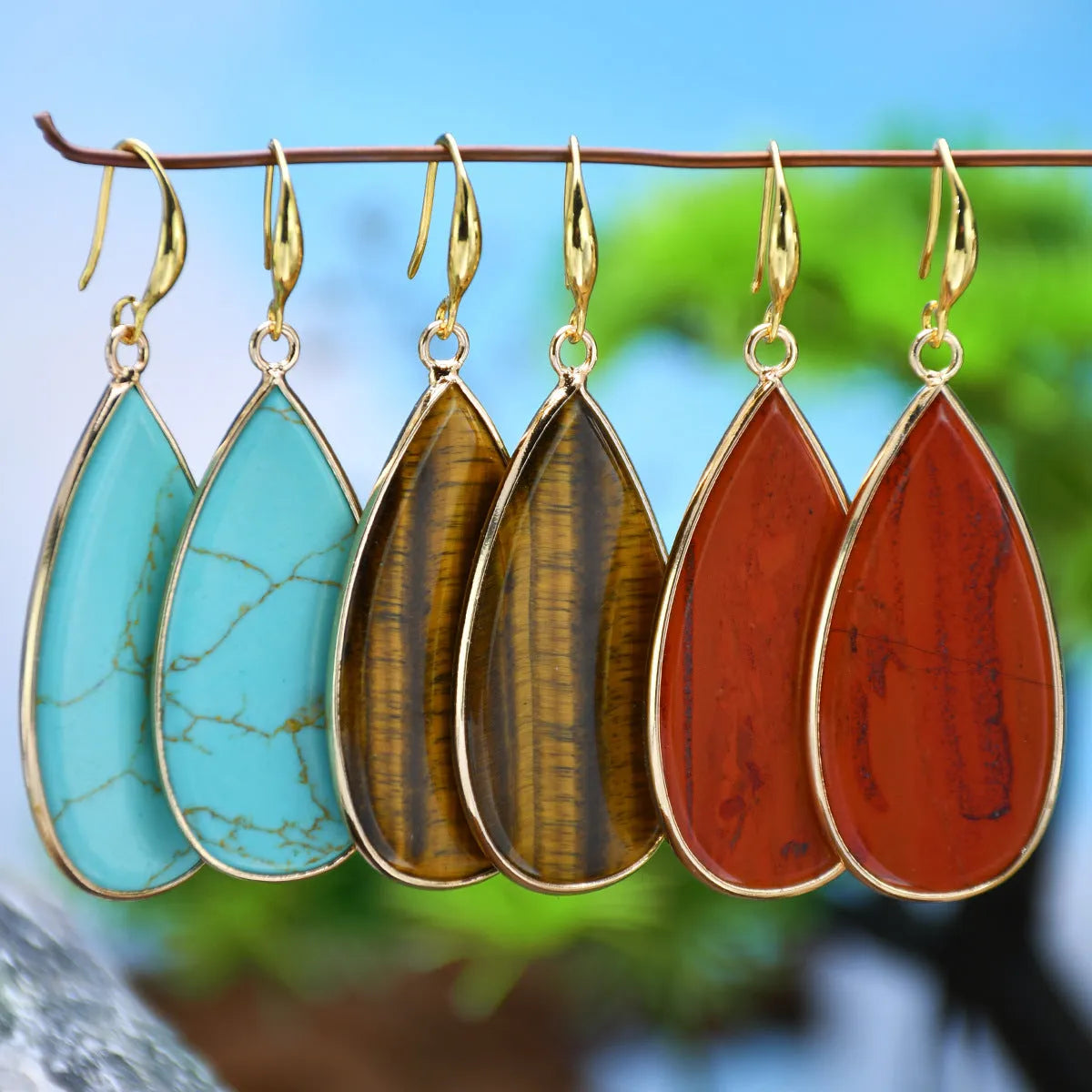 Vintage Tigereye long water drops earrings showing 5-7cm stone drop shape with manual texture processing