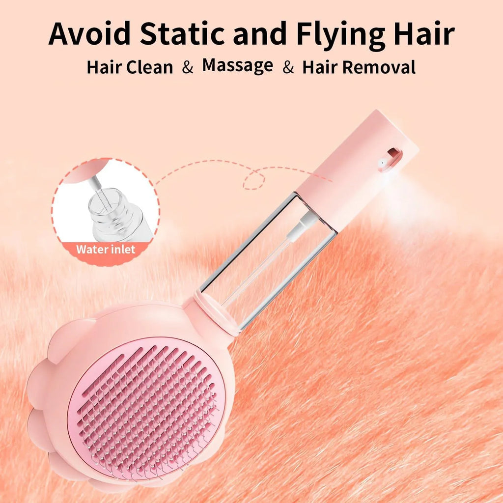 Spray cat brush with grey handle, curved metal pins, and release button for pet grooming and hair removal