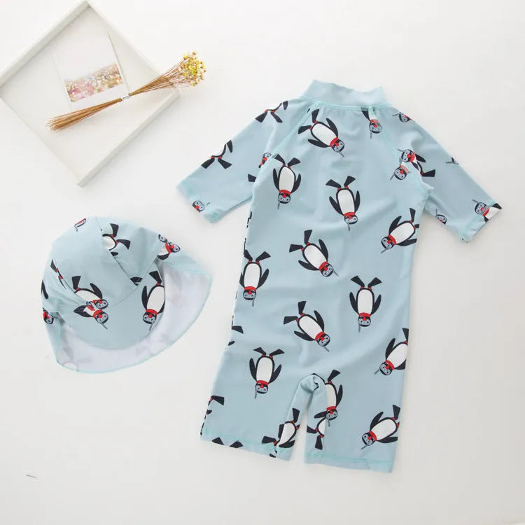 Boy's penguin print long sleeve swimsuit with matching swimming cap for beach sun protection