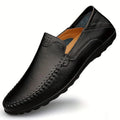 Men's brown leather casual shoes with round toe and flat heel design on rubber sole