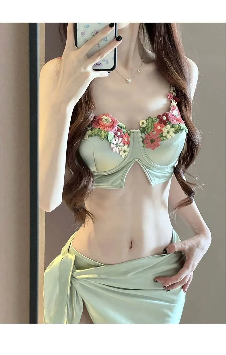 Green women's triangle bikini three-piece swimsuit set with matching skirt