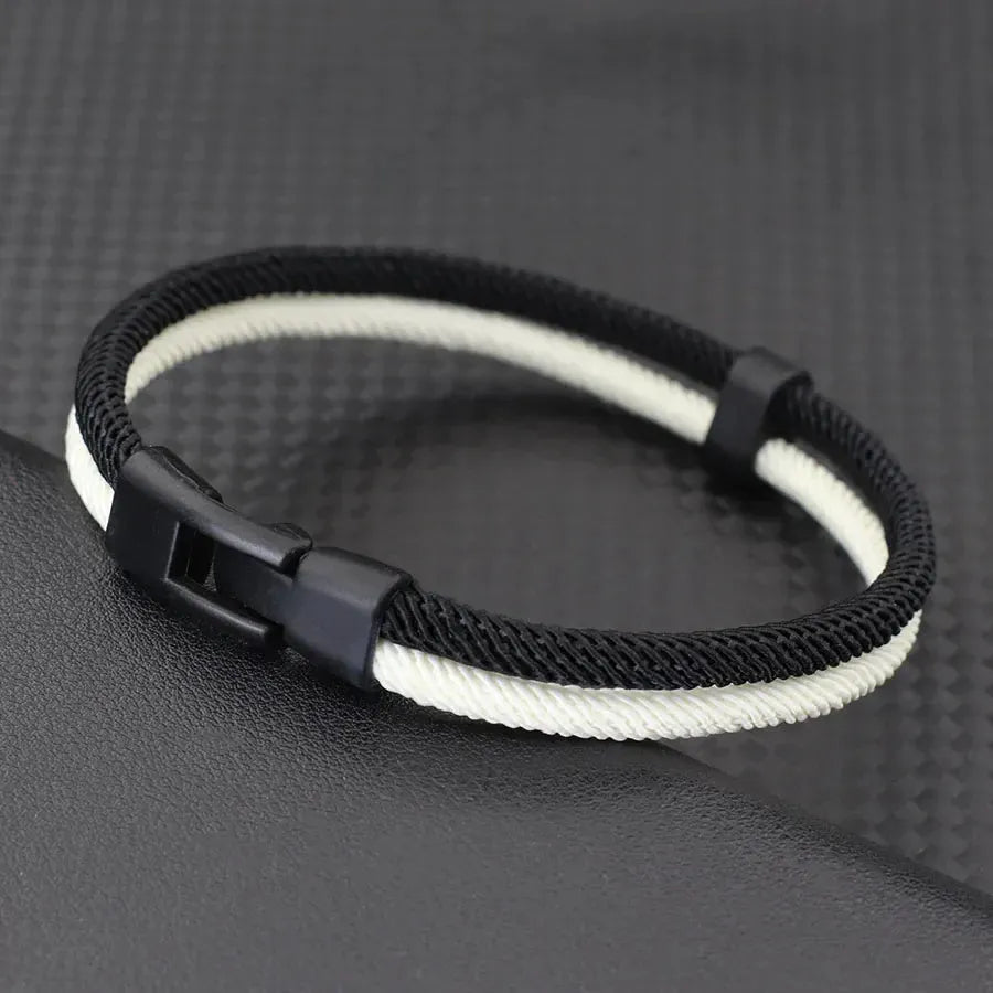Handmade woven hand strap in Milan rope alloy showing black and white colour options with three size measurements