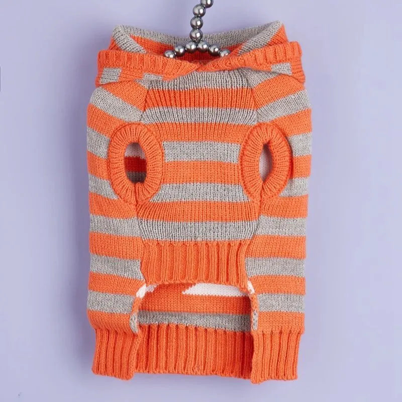 Orange Halloween pet sweater with striped pattern and hooded fur ball design for dogs and cats