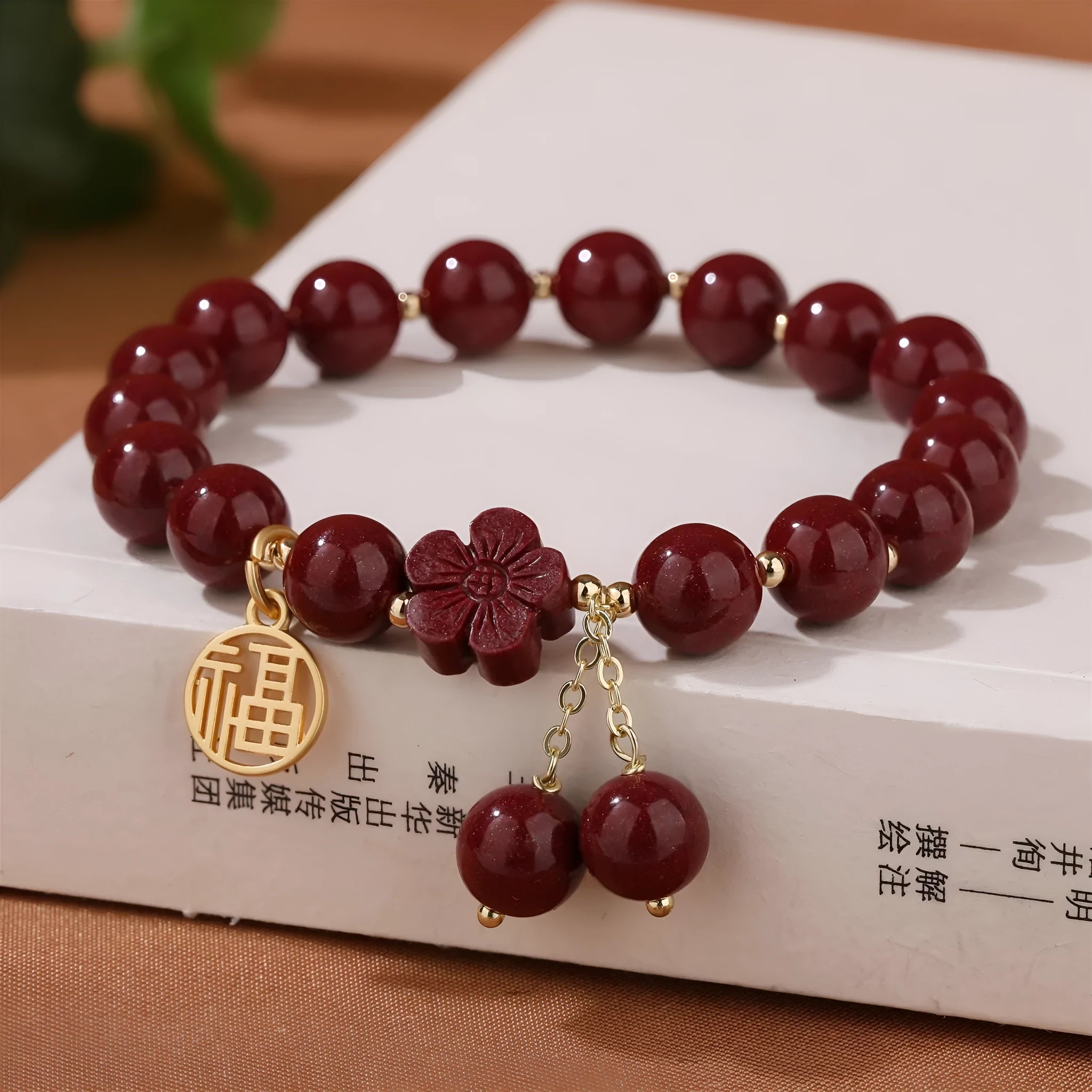 Women's purple gold sand cinnabar bracelet with fu character and peach blossom design on adjustable band