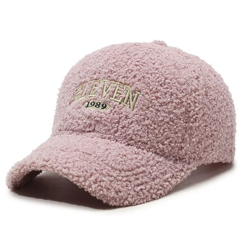 Adjustable winter baseball cap in polyester fabric with machine embroidery detailing