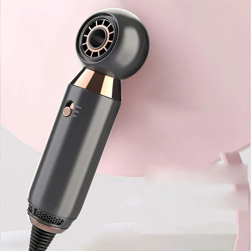 Compact white 800w hair dryer with concentrator nozzle on a table.