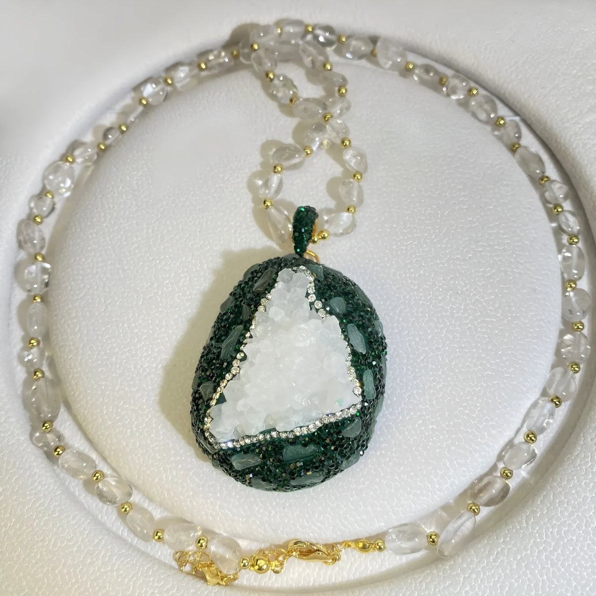 Crystal bud pendant necklace for women with transparent crystal bud, melon seed chain and geometric leaf design, 61-70cm