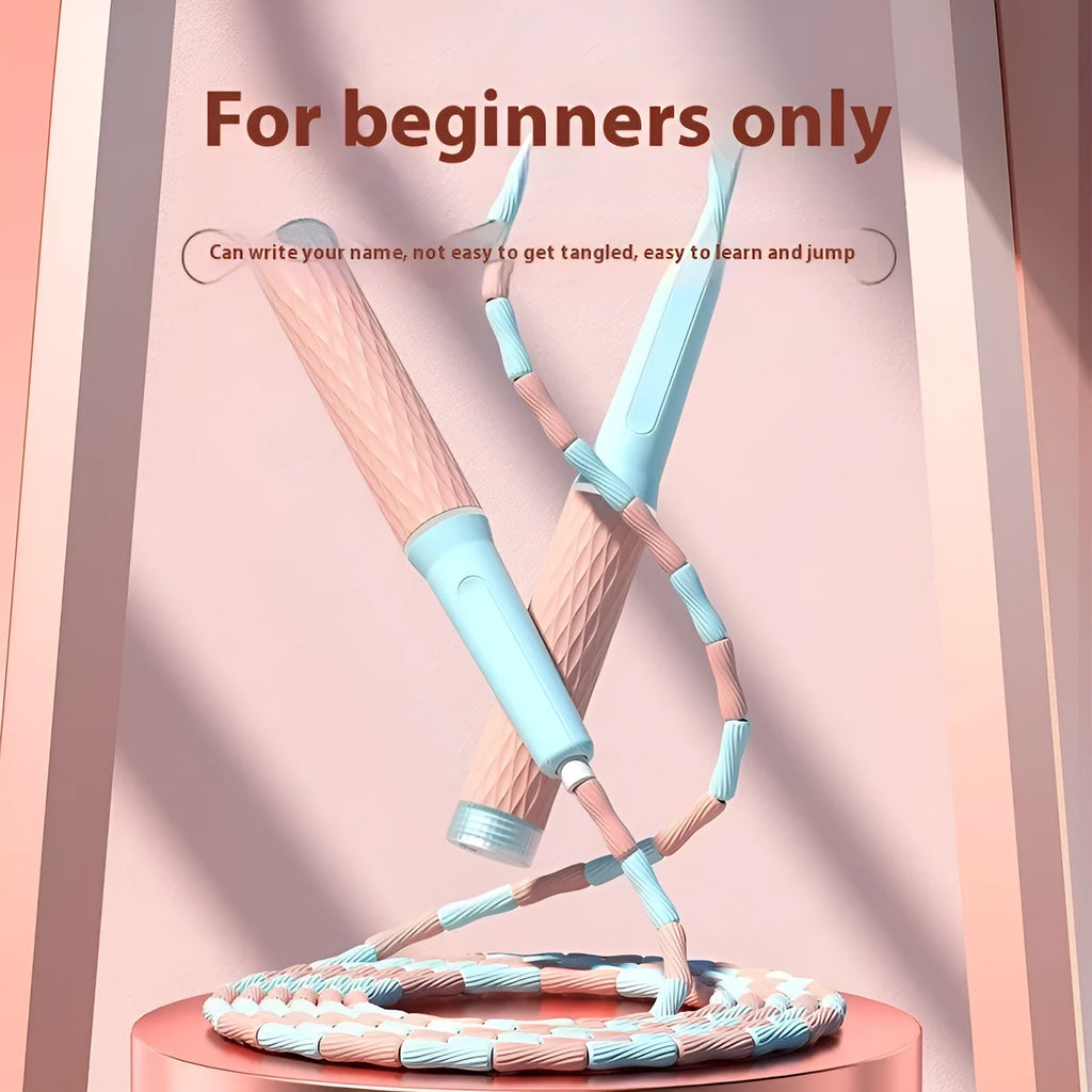 A children's skipping rope with soft bamboo-style beads, shown in a choice of blue, pink, green, and purple colours.