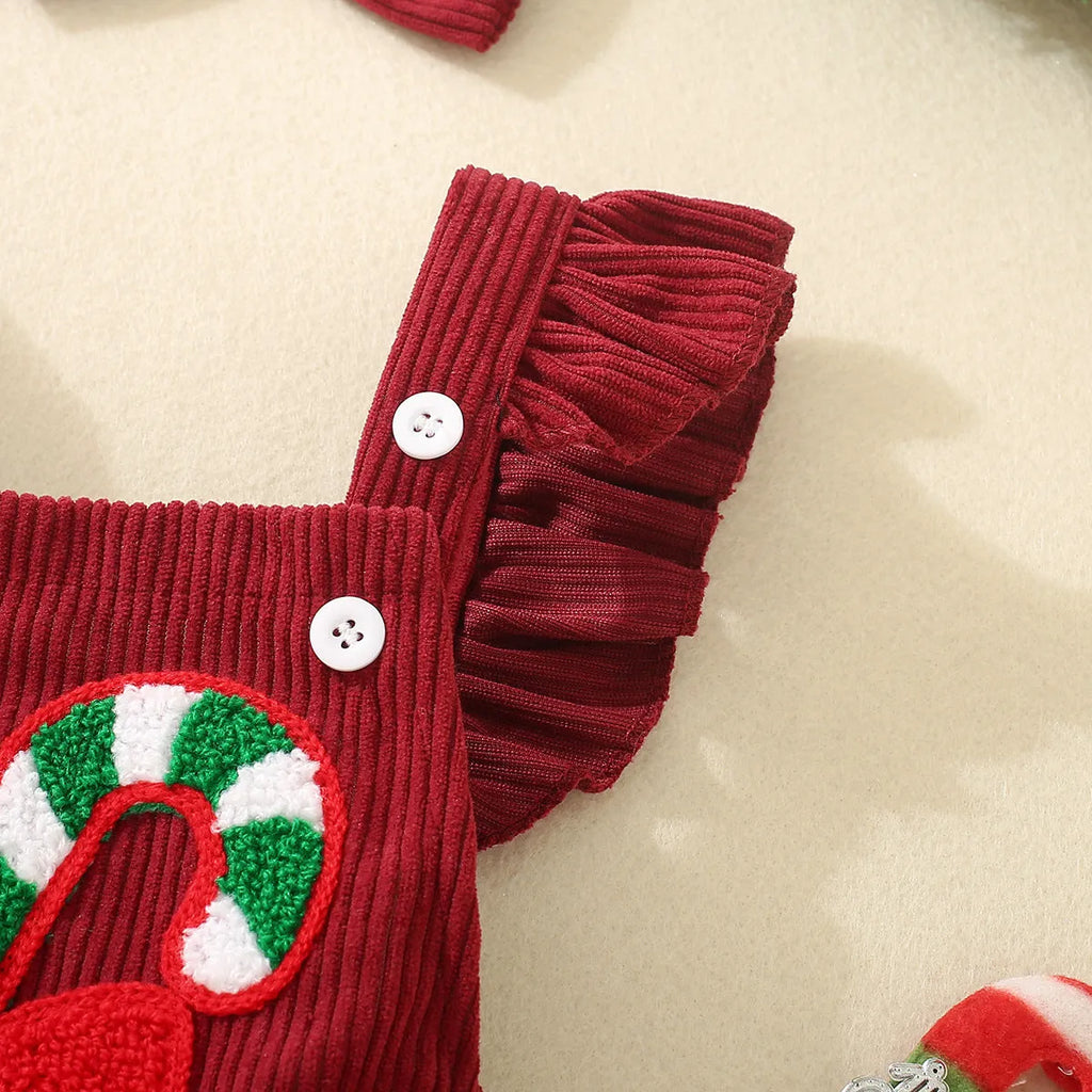 Red sleeveless cotton triangle romper for babies and toddlers with embroidered wing detail, shown in 70cm to 100cm sizes