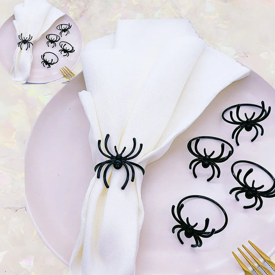 Six black spider-shaped alloy napkin rings for Halloween table decorations with electrophoresis surface finish